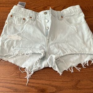 Never worn. Levi’s light wash denim